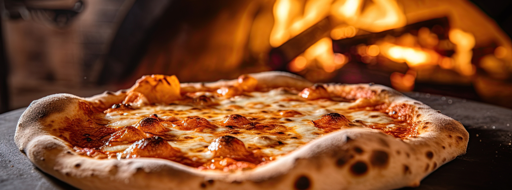 Italian pizza cooked in traditional italian wood fired oven. Gen